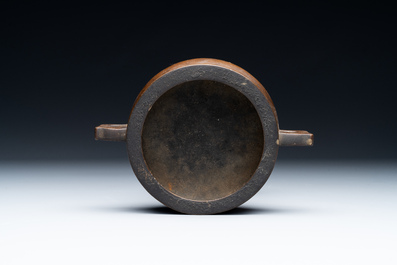 A Chinese bronze censer and stand, Xuande mark, 17th C.