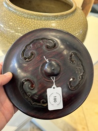 A Chinese ge-type jar with wooden cover and stand, 19th C.