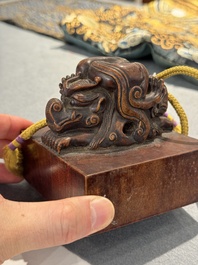 A Chinese sculpted hongmu wooden 'Jiaqing Yubi Zhibao 嘉慶御筆之寶' seal, 20th C.