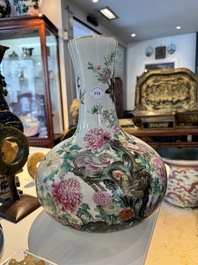 A Chinese famille rose bottle vase with birds among blossoming branches, Qianlong mark, Republic