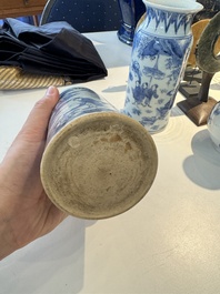 Two pairs of Japanese blue and white vases with figures in a landscape, Edo, 17th C.