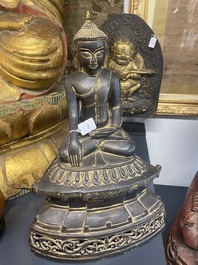 A Burmese bronze Shan Buddha with traces of gilt, 16/17th C.
