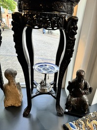 A pair of tall Chinese carved wooden stands with marble tops, 19th C.