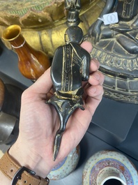 A Burmese bronze Shan Buddha with traces of gilt, 16/17th C.