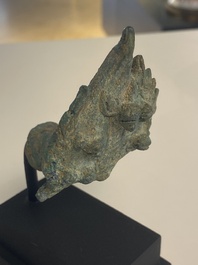 A various collection of bronze khmer palanquin hooks, a bell and a dagger, Angkor Wat periode, Thailand, 12th C.