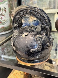 A large collection of nineteen Vietnamese stoneware lime pots, 14th C. and later