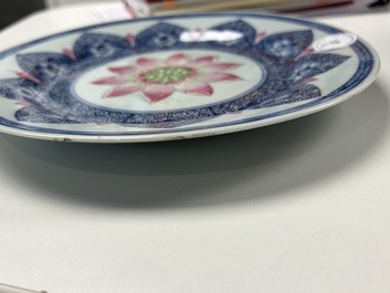 A Chinese famille rose 'lotus' plate for the Southeast Asian market and a 'butterfly and flower' plate, Yongzheng/Qianlong