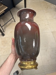 A Chinese monochrome copper-red-glazed vase with gilt bronze mount, 18/19th C