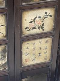 A Chinese seven-fold wooden table screen with painted marble plaques, 19th C.