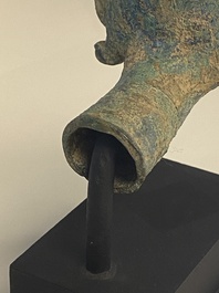 A various collection of bronze khmer palanquin hooks, a bell and a dagger, Angkor Wat periode, Thailand, 12th C.