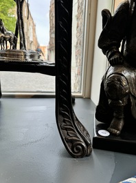 A pair of tall Chinese carved wooden stands with marble tops, 19th C.