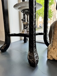 A pair of tall Chinese carved wooden stands with marble tops, 19th C.