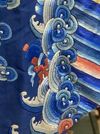 A Chinese gold thread embroidered blue-ground silk 'dragon' robe, 19th C.