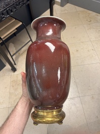 A Chinese monochrome copper-red-glazed vase with gilt bronze mount, 18/19th C