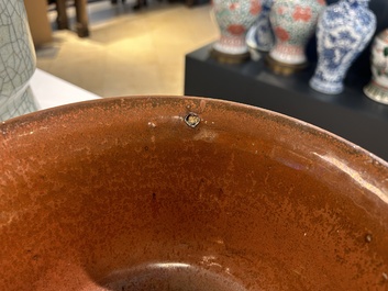 A Chinese ge-type 'gu' vase and an iron-rust-glazed bowl, 19th C.