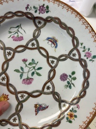 A Chinese famille rose 'lotus' plate for the Southeast Asian market and a 'butterfly and flower' plate, Yongzheng/Qianlong