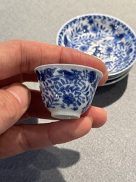 Four Chinese blue and white miniature cups and saucers, butterfly mark, Kangxi