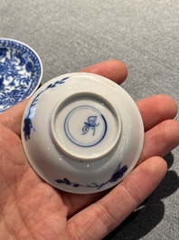 Four Chinese blue and white miniature cups and saucers, butterfly mark, Kangxi