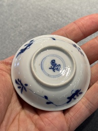 Four Chinese blue and white miniature cups and saucers, butterfly mark, Kangxi