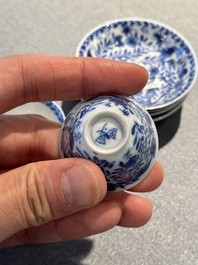 Four Chinese blue and white miniature cups and saucers, butterfly mark, Kangxi