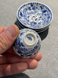 Four Chinese blue and white miniature cups and saucers, butterfly mark, Kangxi