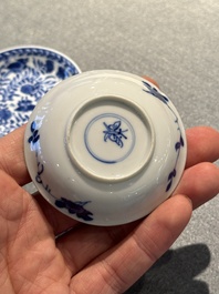 Four Chinese blue and white miniature cups and saucers, butterfly mark, Kangxi