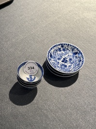 Four Chinese blue and white miniature cups and saucers, butterfly mark, Kangxi