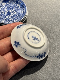 Four Chinese blue and white miniature cups and saucers, butterfly mark, Kangxi