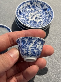 Four Chinese blue and white miniature cups and saucers, butterfly mark, Kangxi