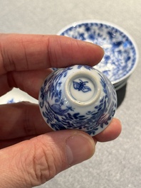 Four Chinese blue and white miniature cups and saucers, butterfly mark, Kangxi