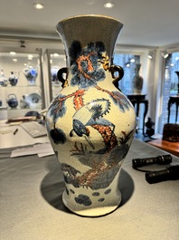 A Chinese blue, white and copper-red Nanking crackle-glazed vase, 19th C.