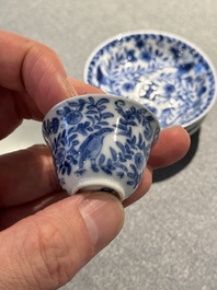 Four Chinese blue and white miniature cups and saucers, butterfly mark, Kangxi