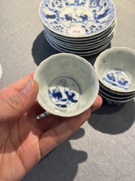 Eight Chinese blue and white 'kite flying boys' cups and saucers, Yongzheng
