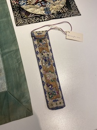 A varied collection of Chinese embroidered silk cloths, a fan-cover and 'rank badges', 19th C.