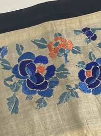 A varied collection of Chinese embroidered silk cloths, a fan-cover and 'rank badges', 19th C.