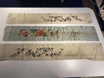 A varied collection of Chinese embroidered silk cloths, a fan-cover and 'rank badges', 19th C.