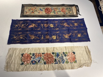 A varied collection of Chinese embroidered silk cloths, a fan-cover and 'rank badges', 19th C.