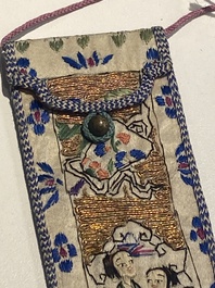 A varied collection of Chinese embroidered silk cloths, a fan-cover and 'rank badges', 19th C.