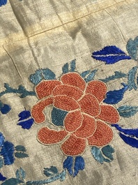 A varied collection of Chinese embroidered silk cloths, a fan-cover and 'rank badges', 19th C.
