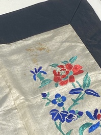 A varied collection of Chinese embroidered silk cloths, a fan-cover and 'rank badges', 19th C.