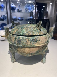 A group of four Chinese archaic bronze wares, late Shang, Warring States and Han