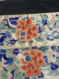A varied collection of Chinese embroidered silk cloths, a fan-cover and 'rank badges', 19th C.