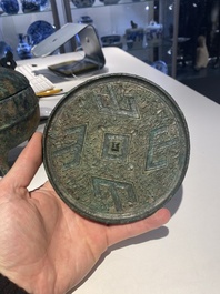 A group of four Chinese archaic bronze wares, late Shang, Warring States and Han