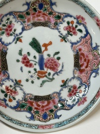 Four Chinese famille rose cups and three saucers with floral design, Yongzheng