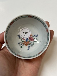 Four Chinese famille rose cups and three saucers with floral design, Yongzheng