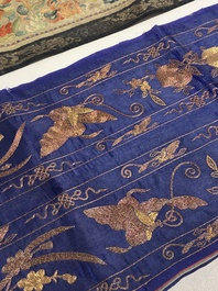 A varied collection of Chinese embroidered silk cloths, a fan-cover and 'rank badges', 19th C.