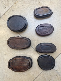 An extensive collection of 137 varied Chinese small wooden stands, 19/20th C.