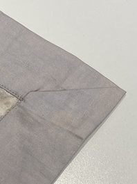 A varied collection of Chinese embroidered silk cloths, a fan-cover and 'rank badges', 19th C.