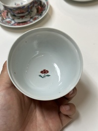 Four Chinese famille rose cups and three saucers with floral design, Yongzheng