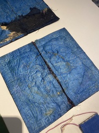 A varied collection of Chinese embroidered silk cloths, a fan-cover and 'rank badges', 19th C.